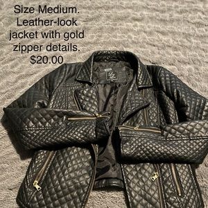 Size medium leather-look jacket with quilted design and gold zipper details.